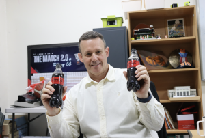 Dr. Nave holding his prized possessions.